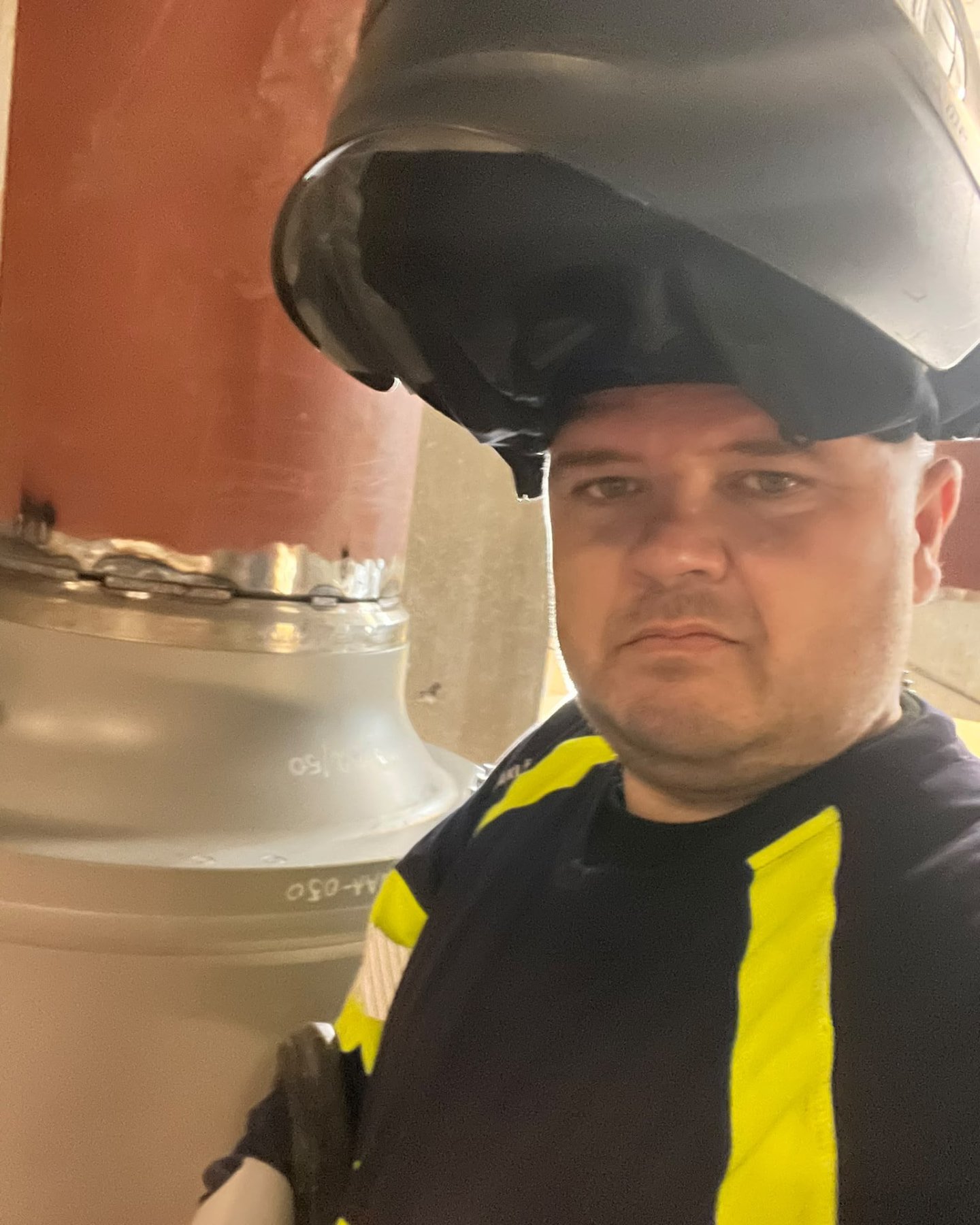 Andrei Ionuț Ungureanu, ejer af Workforce Partner, med svejsehjelm